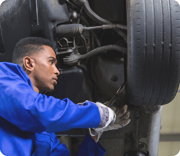 mechanic fixing car tyre